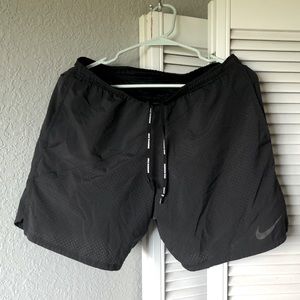Nike running Men’s shorts 7”. M